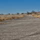 The backstretch that local and touring race cars used to come around to, meeting more than one set of grandstands as they did.